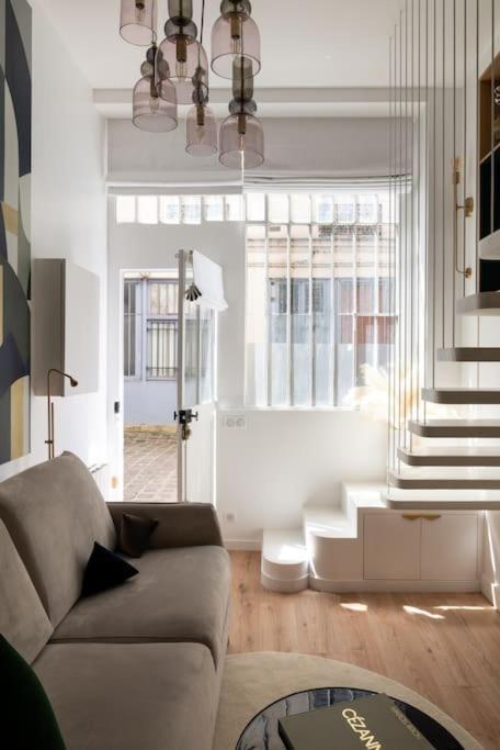 Bel Appartement D'Architecte Au Coeur De Parijs Buitenkant foto